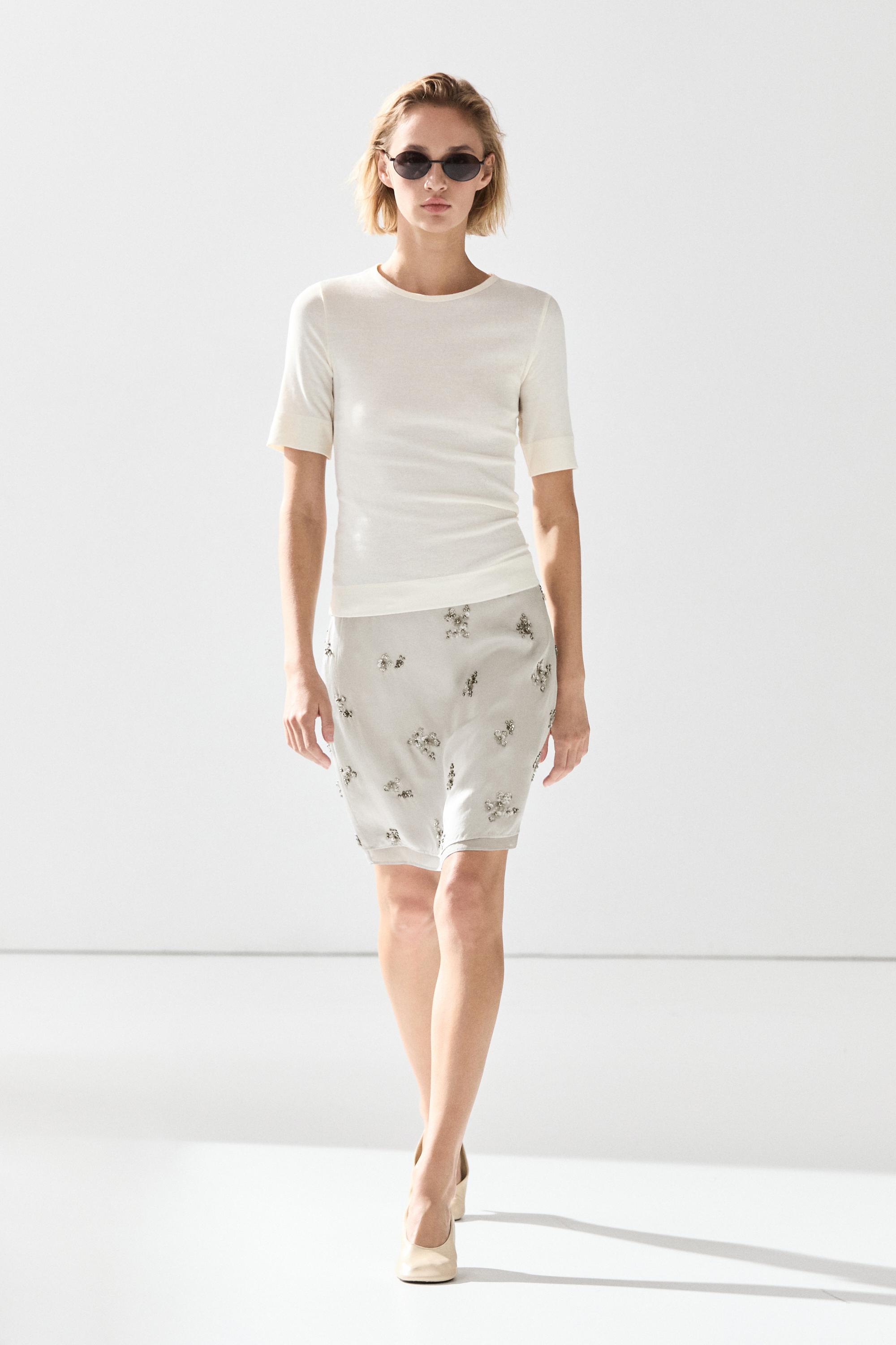 Mini skirt with beaded detail